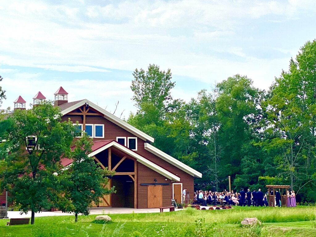 Wedding ceremony next to the barn venue
