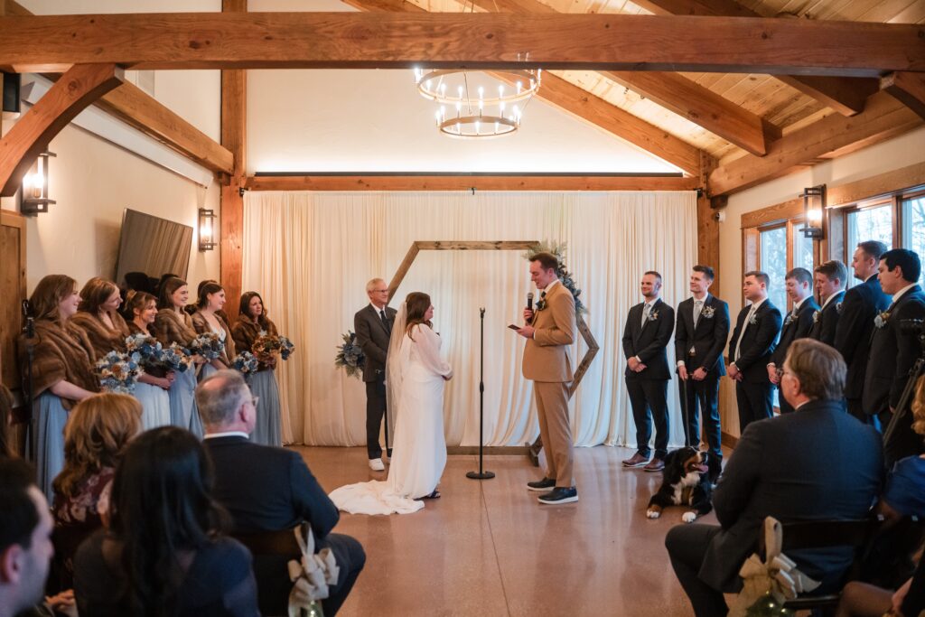 Two people exchanging vows indoors